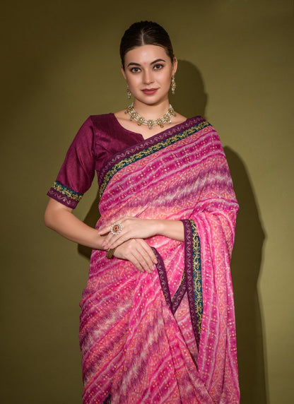 Pink Georgette Foil Print Saree With Heavy Sequins And Diamond Pattern Lace Border