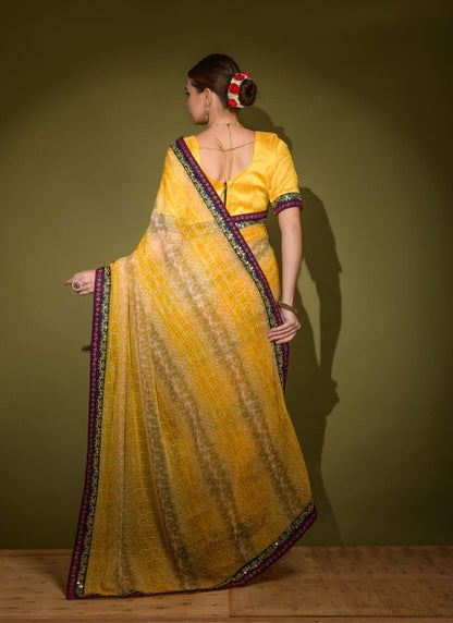 Yellow Georgette Foil Print Saree With Heavy Sequins And Diamond Pattern Lace Border